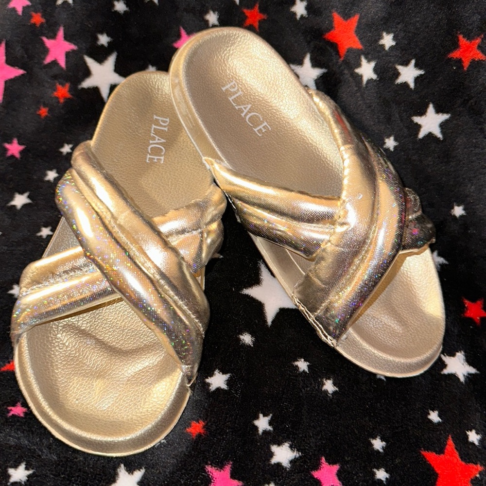 Never worn gold crisscross girls slides